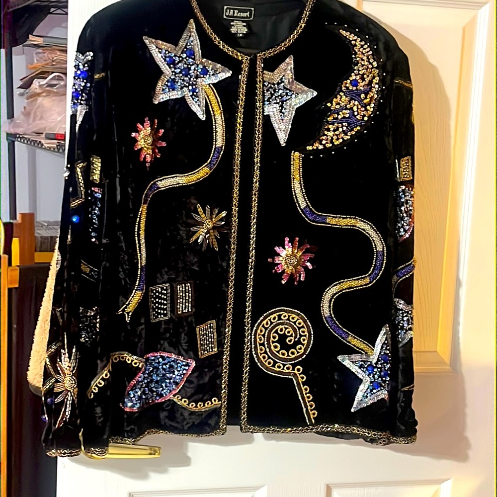 Vintage, black velvet, beaded and sequins blazer. Beautiful designs.